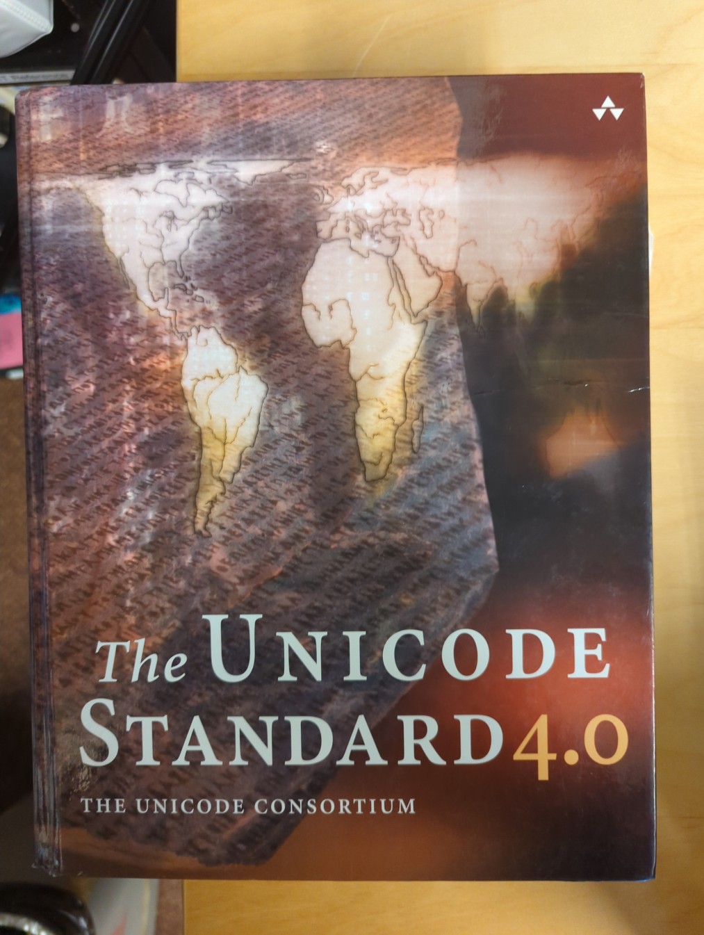 The cover of the Unicode Standard 4.0 book